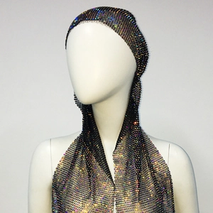Detailed macro view of black mesh headpiece with colorful sparkling rhinestones