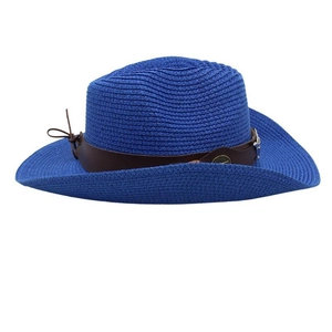Detail of blue straw cowboy hat featuring brown leather band and metal accessories