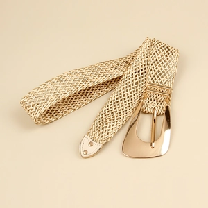 Close-up of gold irregular metal buckle and beige elastic woven dress belt for women