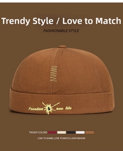 Detail of cotton docker hat with Freedom & new life embroidery and zigzag side stitching