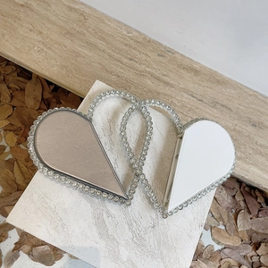 Sparkling rhinestone heart-shaped evening clutch bag with dual carry handles for parties