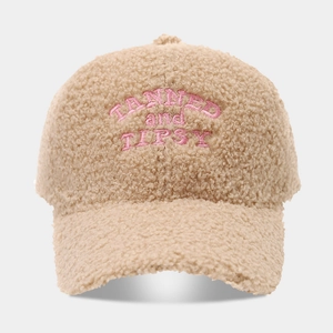 Beige teddy fleece baseball cap with pink embroidered TANNED and TIPSY lettering