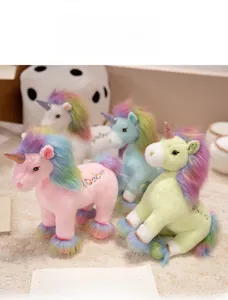 Detailed view of plush unicorn toys with rainbow manes and Wisdom embroidery