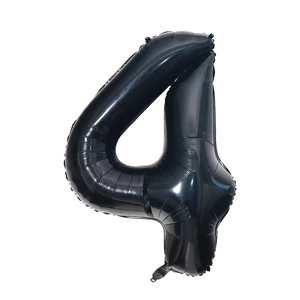 Detail shot of a slim black number 4 foil balloon for birthday party decorations