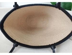 Top view showing the spacious interior lining and beige woven texture of this tote bag