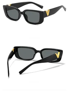 Detail show of retro black thick frame sunglasses with golden V-shaped metal hinge