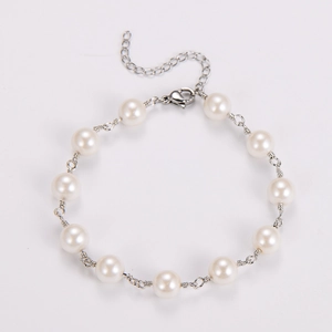 Close-up of handmade baroque pearl bracelet with silver lobster clasp and extension chain