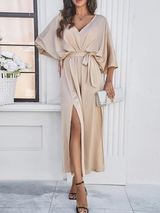 Elegant beige satin V-neck maxi dress with batwing sleeves and waist tie detail