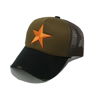 Detail of army green trucker hat with 3D orange star embroidery and mesh back