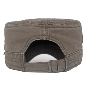 Detail of adjustable metal buckle and stitching on vintage washed cotton flat top cap