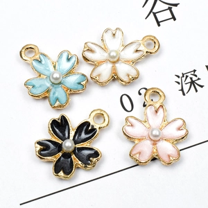 Pastel enamel cherry blossom flower charms with pearl centers in alloy metal finish
