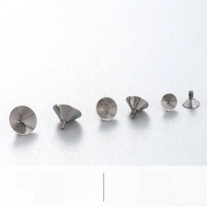 Detailed macro view of F136 titanium alloy screw parts for body piercing accessories