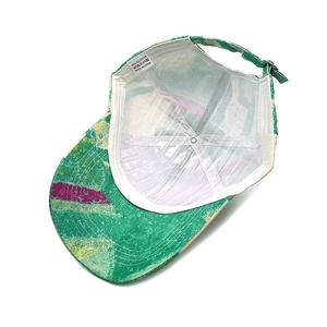 Inside view of colorful tie-dye polyester baseball cap with abstract graffiti pattern
