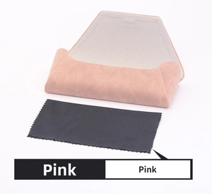 Detail view of pink PU leather foldable eyeglass case with microfiber cleaning cloth