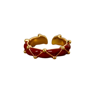 24K gold plated open ring featuring red enamel finish and golden diamond pattern texture