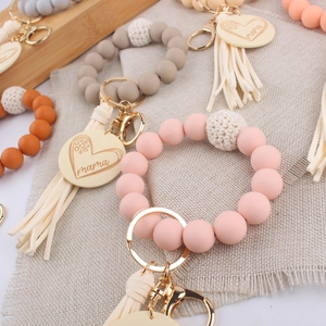 Silicone bead keychain bracelets with tassels and mama wood charms in assorted colors