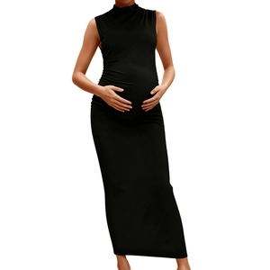 Detail of elegant black sleeveless maternity maxi dress with a turtleneck and ruched sides
