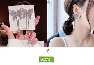 Detail of S925 silver needle butterfly tassel earrings with sparkling white crystals