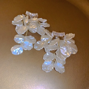 Elegant white petal drop earrings with gold-plated fringe and sparkling crystals