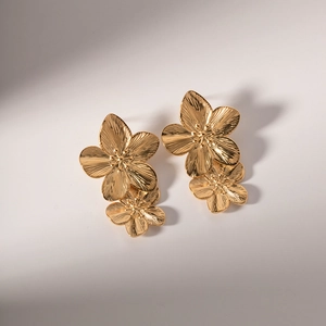 Fashionable gold double flower stud earrings in stainless steel for women with textured petals