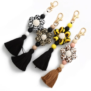 Silicone bead keychain with floral patterns and tassels in multiple stylish color options