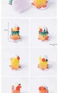 Detail of assorted mini PVC cake charms with strawberry cream and 5.5cm size markings