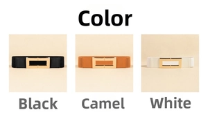 Three elastic waist belts in black, camel, and white with elegant gold buckles