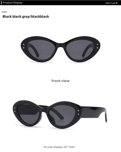 Baroque retro black cat-eye sunglasses with gold stars, front and 45 degree side views