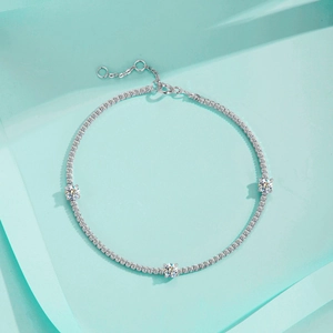 Elegant S925 sterling silver moissanite bracelet with cube design on blue background