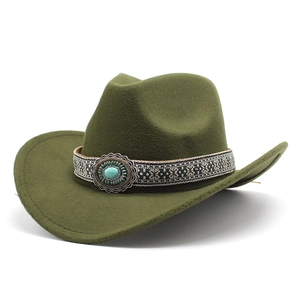 Detailed view of turquoise stone and ethnic braided band on dark green western felt hat