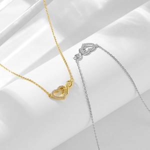 Infinity heart sterling silver necklace in gold and silver finish with zircon stones
