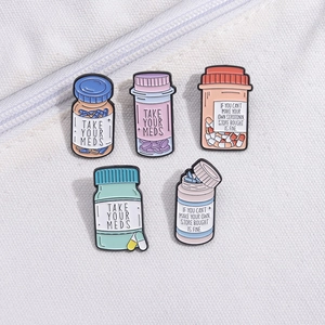 5-piece colorful enamel pin set with Take Your Meds slogan for bags and clothing