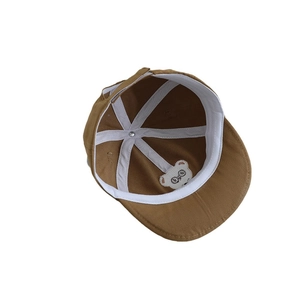 Brown baby baseball cap with cute bear embroidery and dual-pom design for sun protection