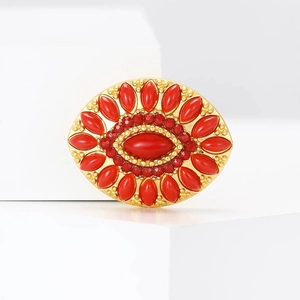 Elegant gold vintage Turkish brooch with red drop rhinestones and a large oval center stone