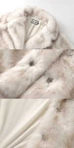 Détail du col en fausse fourrure et de la doublure lisse de ce manteau d'hiver chaud