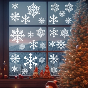 White Christmas snowflake window stickers for festive home glass decoration with winter scenery