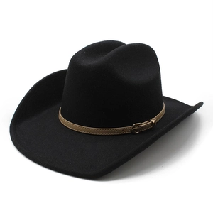 Detailed view of black felt western cowboy hat with vintage brown leather belt buckle