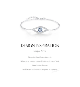 Detailed close-up of S925 silver evil eye bracelet with blue and white sparkling crystals