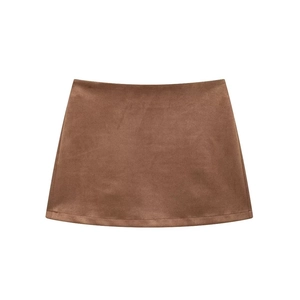 Flat lay close-up of a brown suede A-line mini skirt with high-quality soft texture