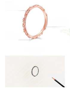 Detail of 925 sterling silver ring featuring vintage vine pattern and oxidized finish