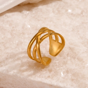 Adjustable golden multi-layer crisscross stainless steel ring on white stone background