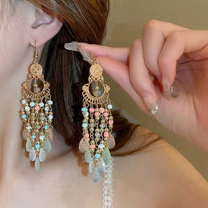 Bohemian beaded fringe drop earrings with colorful crystals and teardrop pendants
