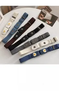 Seven colors of elastic waist belts featuring daisy patterns and minimalist metal buckles