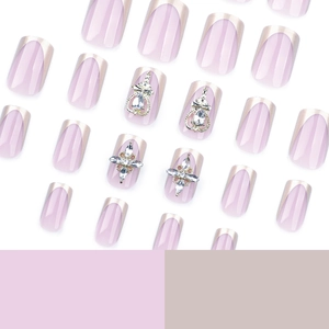 Französische goldene Kunstnägel mit rosa Basis, Silberrand und Strasssteinen in Quadratform