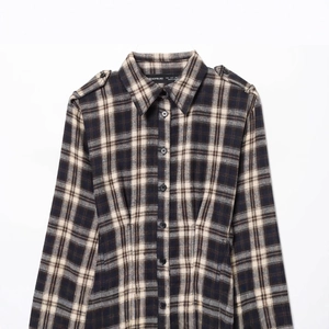 Brown and beige plaid long sleeve midi dress with pleated detail on white background
