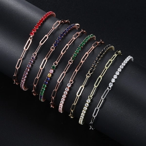 Set of seven paperclip link bracelets featuring multi-colored cubic zirconia in gold plating