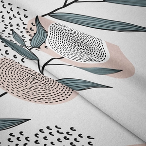 Detail shot of bohemian tapestry showing soft fabric texture and abstract leaf patterns