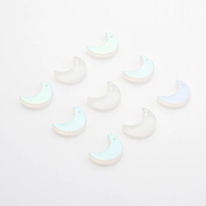 Detailed view of 12x16mm moon-shaped iridescent crystal pendants for DIY jewelry making