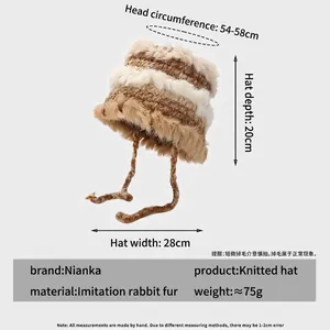 Winter rabbit fur knit hat with beige and brown patchwork design and earflap ties