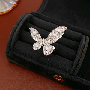 Sparkling zircon butterfly open ring in silver finish showcased in a black velvet jewelry box